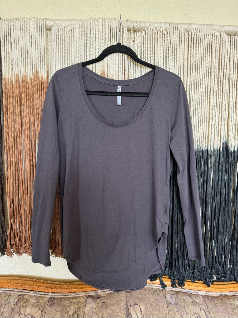 Grey long sleeve Fabletics top with cut out side details; perfect condition